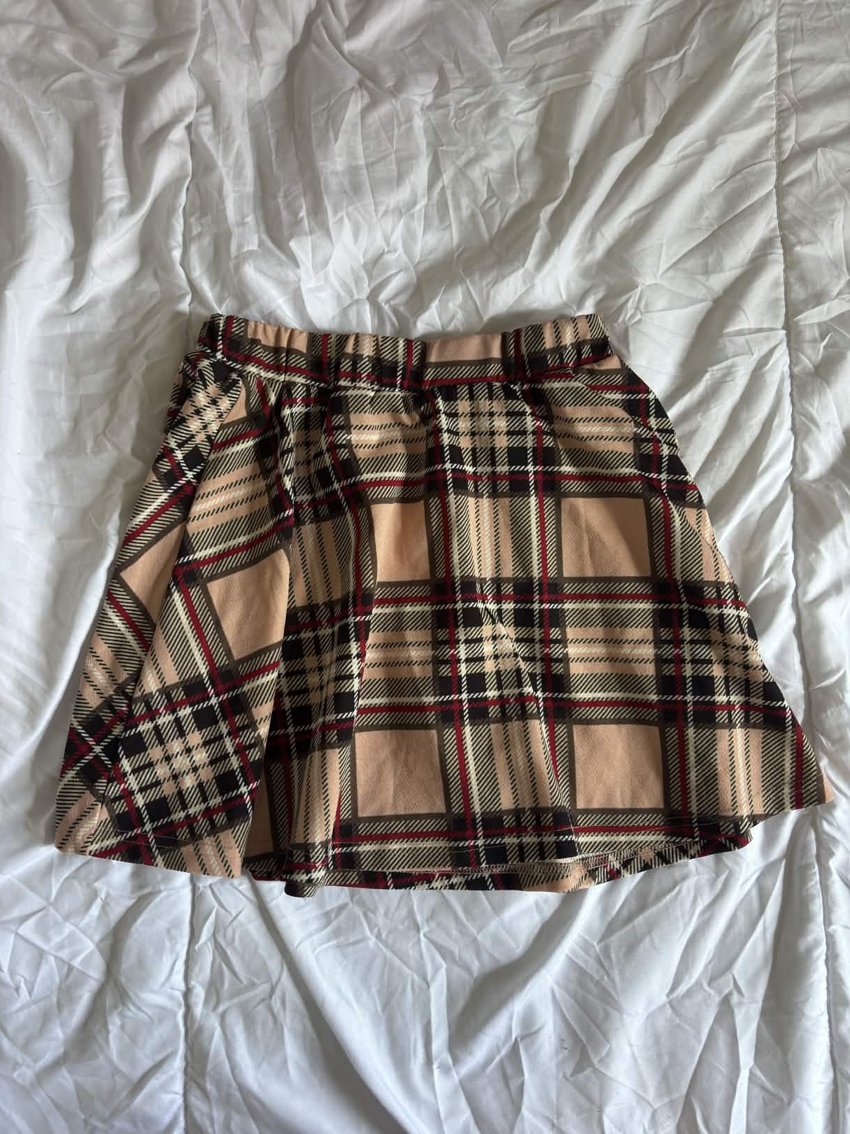 Jupe plissée à carreaux (style tartan)