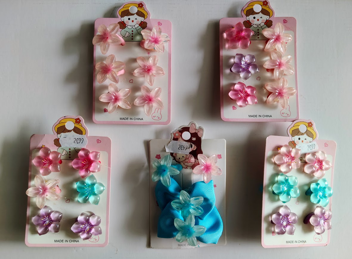 Accessoires cheveux fillette élastiques et barrettes fleurs