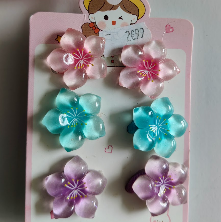 Accessoires cheveux fillette élastiques et barrettes fleurs