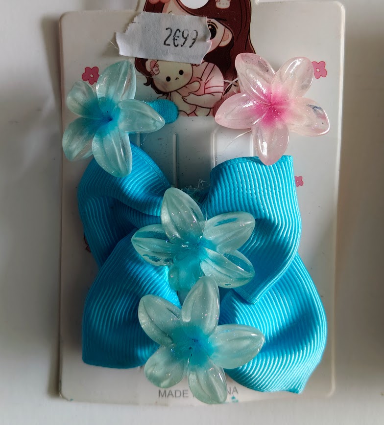 Accessoires cheveux fillette élastiques et barrettes fleurs