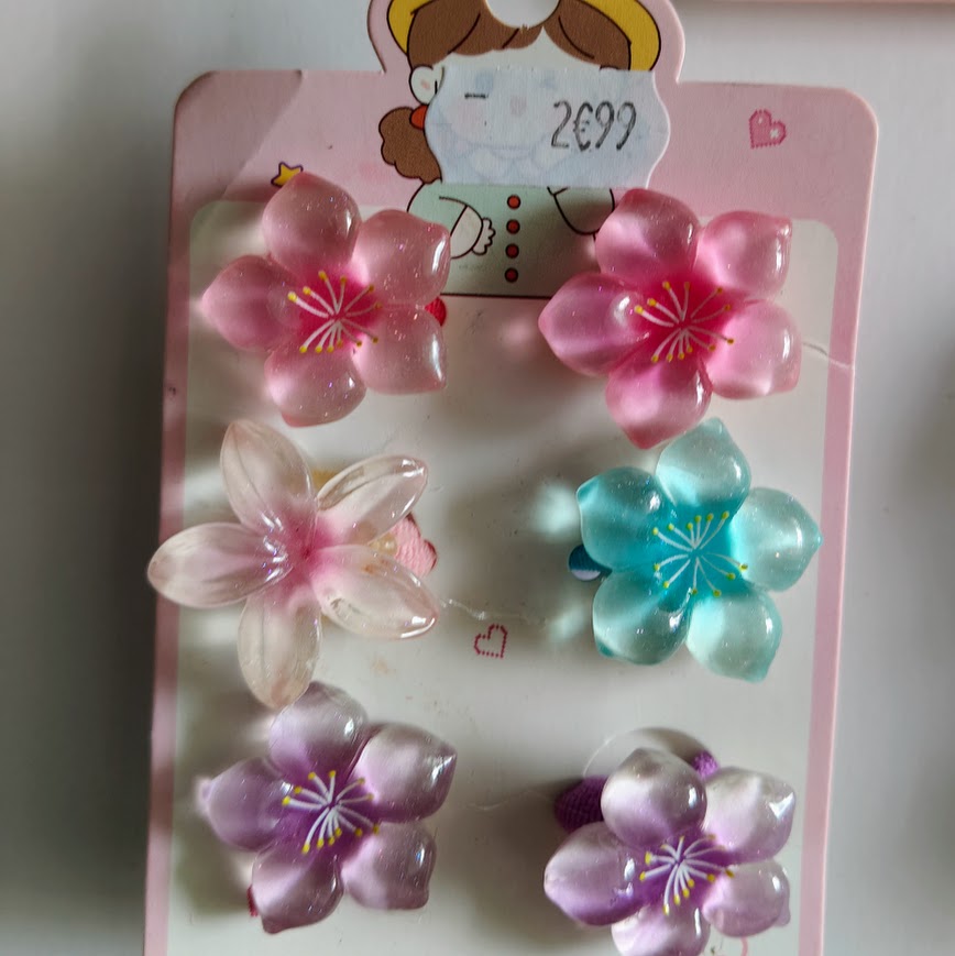 Accessoires cheveux fillette élastiques et barrettes fleurs